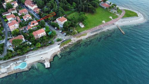 an aerial view of an island with a bridge over the water at Sea View Terrace Apartment Izola in Izola