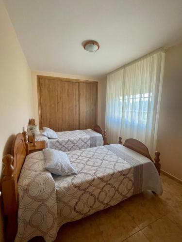 Postel nebo postele na pokoji v ubytování B&C House