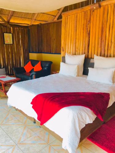 Katil atau katil-katil dalam bilik di Hippo Paradise Lodge and Campsites
