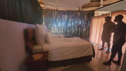 Katil atau katil-katil dalam bilik di Hippo Paradise Lodge and Campsites