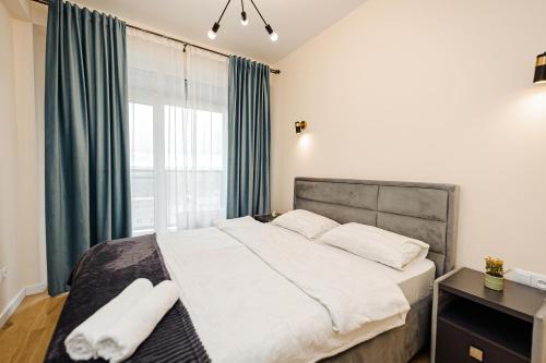 Katil atau katil-katil dalam bilik di Oasis apartment