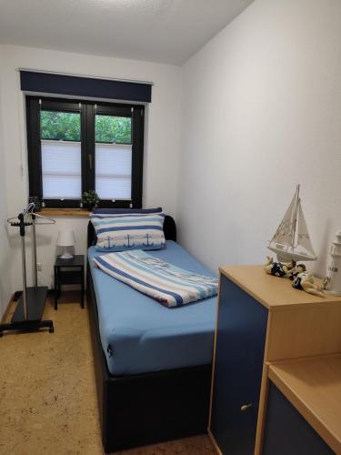 En eller flere senge i et værelse på Ferienwohnung Nähe Lüneburg und Bad Bevensen