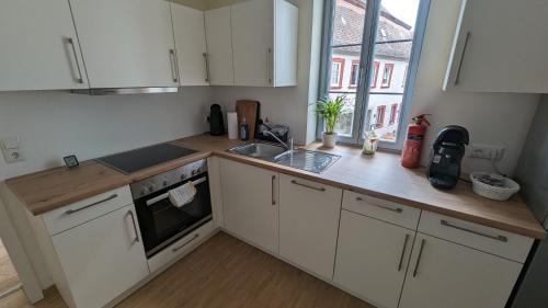 Kuchyň nebo kuchyňský kout v ubytování Ferienwohnung Michelskeller