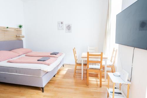 Ένα ή περισσότερα κρεβάτια σε δωμάτιο στο Vienna City Apartment Erlachgasse