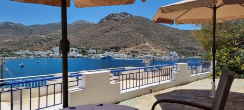 a balcony with a view of a body of water at Xylokeratidi Sea View Family Studio in Rakhídhion