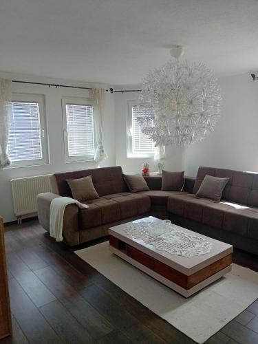 a living room with a couch and a coffee table at MEDINA in Sarajevo
