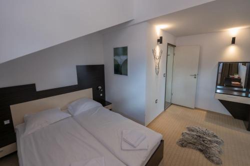 Ένα ή περισσότερα κρεβάτια σε δωμάτιο στο Kadiyata Guest House