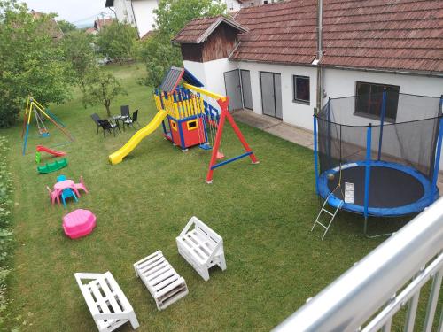 an aerial view of a backyard with a playground at Apartman TT Stan na dan Trn Laktaši in Laktaši
