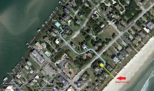 a map of a parking lot next to the water at As Good As It Gets in Surf City