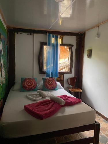 Katil atau katil-katil dalam bilik di Eco Hostal La Perla Tayrona