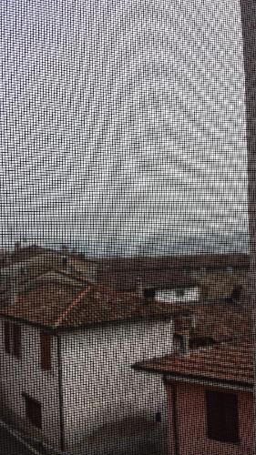 a window with a view of a body of water at La Torretta - Cerreto Grue in Sarezzano