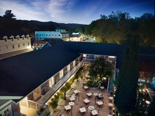 an aerial view of a building with tables and umbrellas at El Dorado Hotel in Sonoma