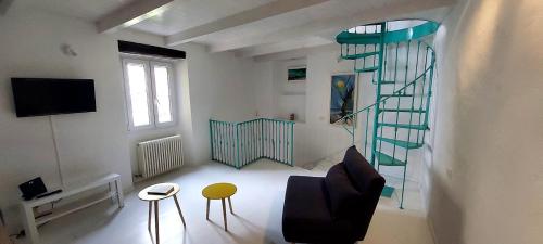 TV a/nebo společenská místnost v ubytování Casa Colore