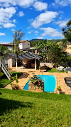 Πισίνα στο ή κοντά στο Quarto em Miguel Pereira - Casa Ohana