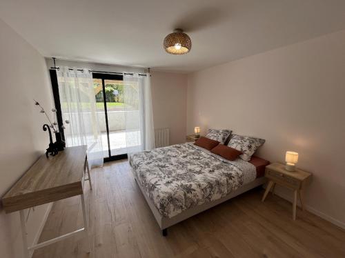 Ein Bett oder Betten in einem Zimmer der Unterkunft Belle-Île