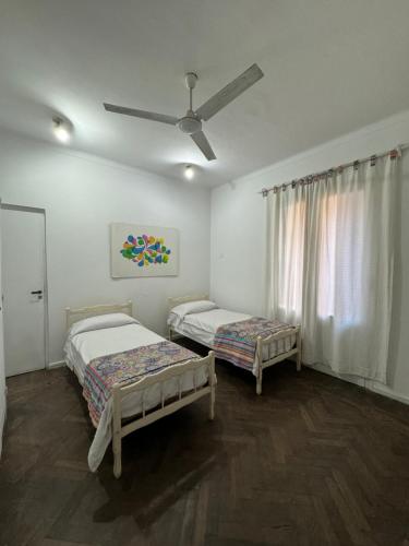 Ένα ή περισσότερα κρεβάτια σε δωμάτιο στο CASA LE FORT- Centro