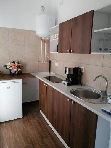 Kuchyň nebo kuchyňský kout v ubytování Urban Mood Studio