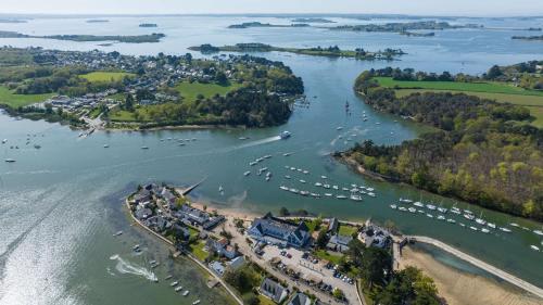 an aerial view of a river with boats at Best Western Plus Le Roof Vannes Bord de Mer in Vannes