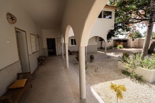 an entrance to a building with an archway at La Teranga Toubacouta in Bani