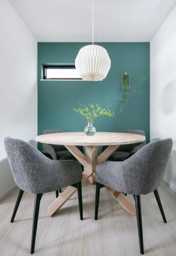 a dining room with a table and chairs at ぷふか東向島2 in Tokyo