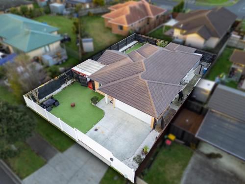 an overhead view of a house with solar panels on the roof at Lux 4 Bedroom in Auckland with Spa and Light Breakfast in Auckland