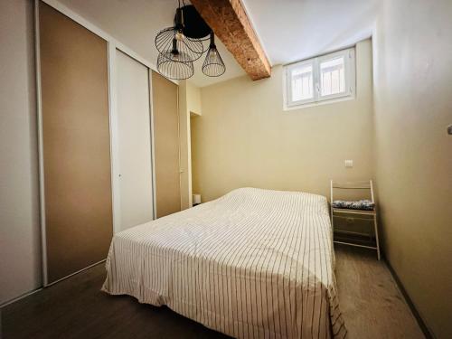 Posteľ alebo postele v izbe v ubytovaní Charmant T3 à Port-Vendres, 4 pers., proche quais, patio, sans ascenseur - FR-1-309-378