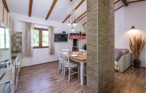 Kuchyň nebo kuchyňský kout v ubytování Amazing Home In Krnica