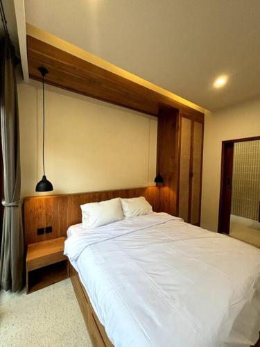 Postel nebo postele na pokoji v ubytování Modern 2BR Tropical Villa