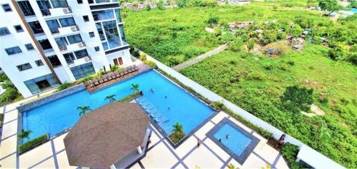 A view of the pool at Mactan Newtown Beach Condo or nearby