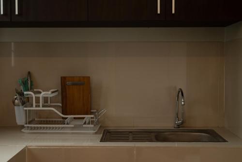 a kitchen counter with a sink and a sink at Terrace Mumbul in Nusa Dua