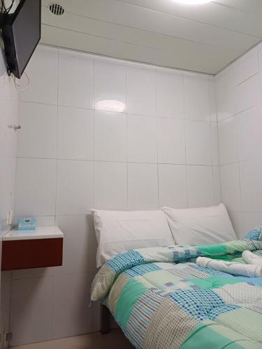 Katil atau katil-katil dalam bilik di DREAMNEST GUESTHOUSE Tsim Sha Tsui