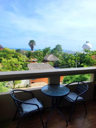 Un balcón o terraza de Adelfa Suites