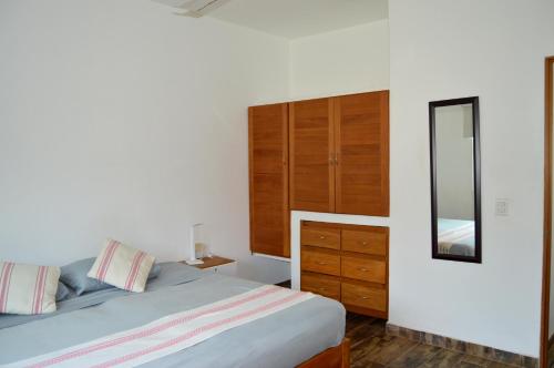 Cama o camas de una habitación en Adelfa Suites