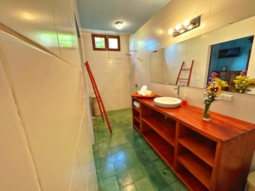 a bathroom with a sink and a mirror at Hotel La Polvora in Granada