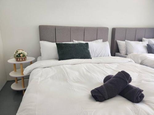 Postel nebo postele na pokoji v ubytování Petaling Jaya SS17 Landed Home 5 Bedrooms for up to 18pax, Eastin Hotel, Jaya One, University Malaya,TTDI, Phileo Damansara