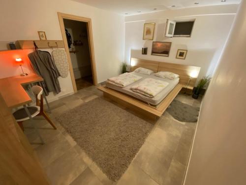 Ένα ή περισσότερα κρεβάτια σε δωμάτιο στο A6 Apartment