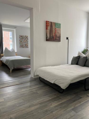 a bedroom with two beds in a room at Ferienwohnung Delta in Heinsberg
