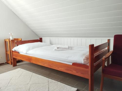 Postel nebo postele na pokoji v ubytování WineBerry Apartment