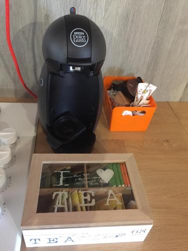 a black vase sitting on top of a table at Casa Grazia in Magreglio