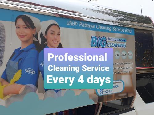 a billboard with a sign for a cleaning service at Luxury Garden Pool Villa near Beach & Walking Street in Pattaya South