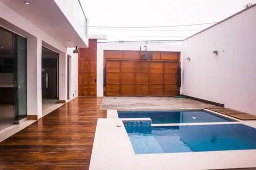 Πισίνα στο ή κοντά στο CA1 - Casa completa con Piscina e hidromasajes