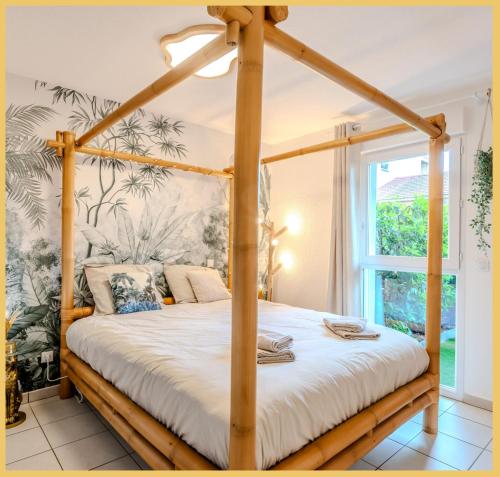 Postel nebo postele na pokoji v ubytování Le Paradis Tropical