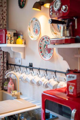 Una cocina o cocineta en Eperkert Vendégház