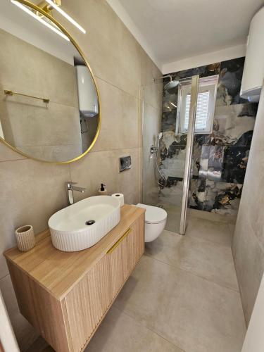 Kúpeľňa v ubytovaní Appartment Daniela Funtana