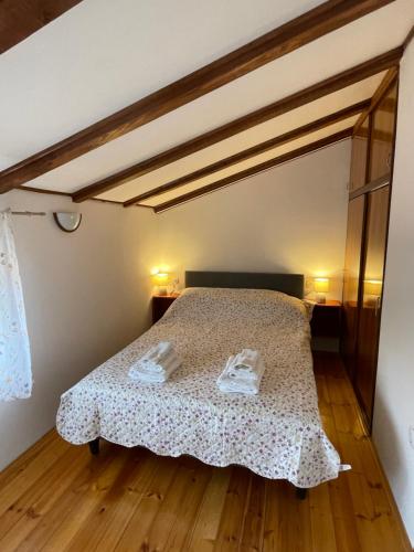 a bedroom with a bed in a room at Apartment Grappa in Vrbnik