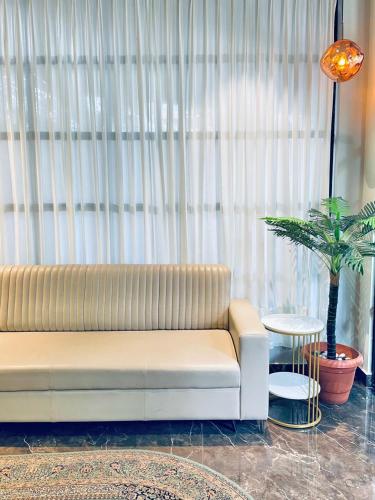 Ruang duduk di Muziris Manor Residency