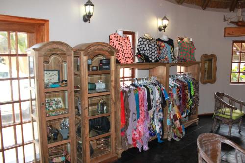 a store with racks of ties in a room at N'taba River Lodge & Spa in Port St Johns