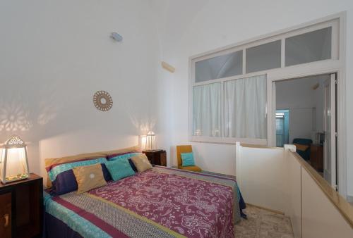 Кровать или кровати в номере Casa La Ronza