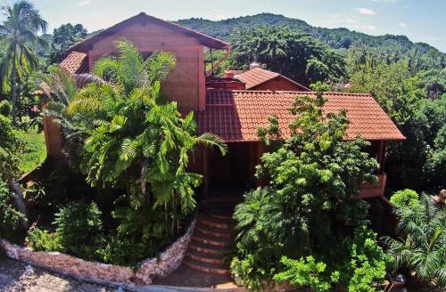a house in the middle of a forest at Hotel Casa San Pancho in San Francisco