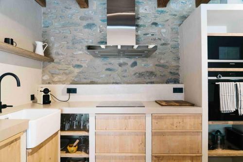 Η κουζίνα ή μικρή κουζίνα στο Cal Rus Apartament 3